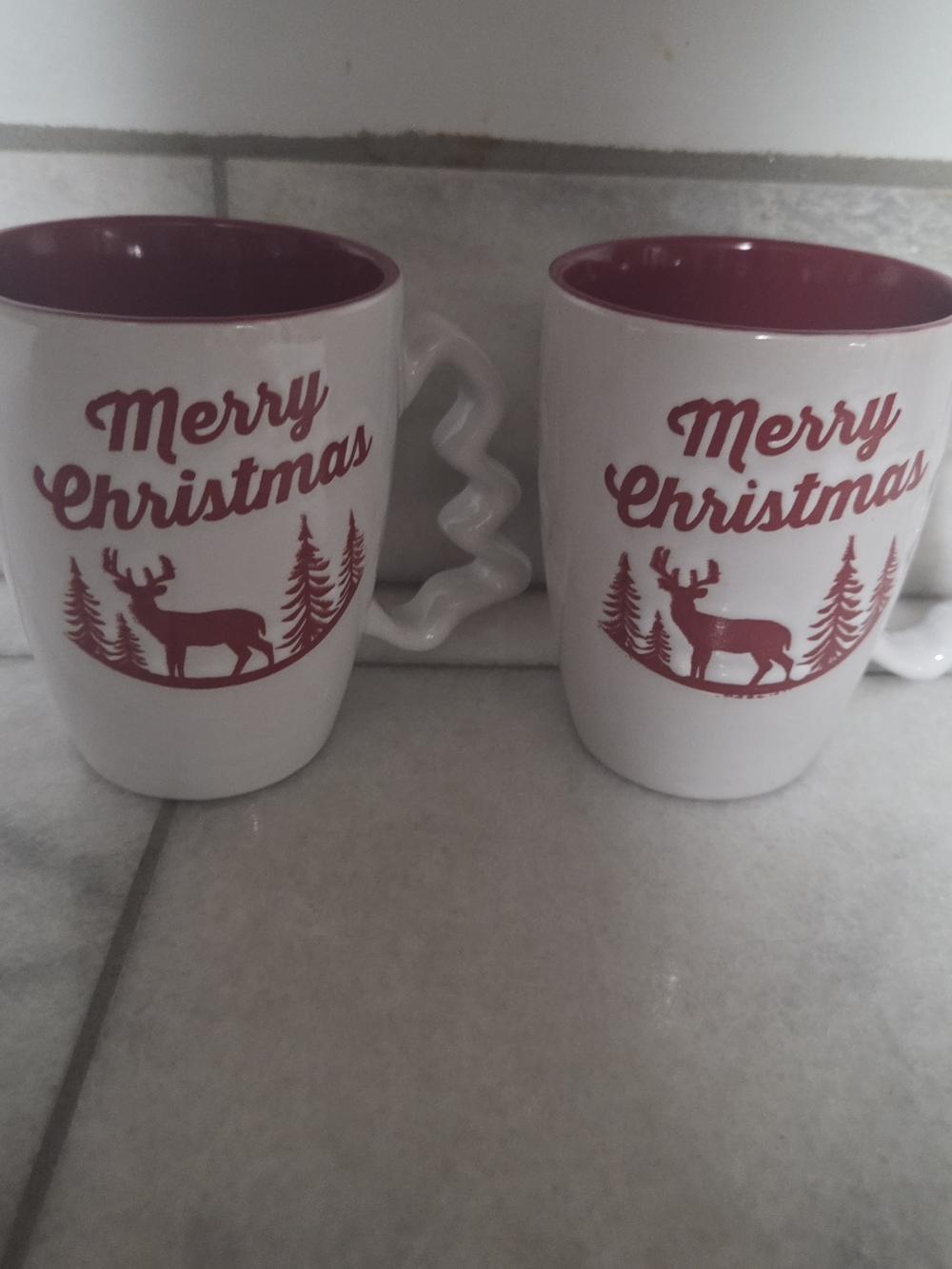 Festive White Ceramic Mugs with Red Interior and Reindeer Print, Set Of 2